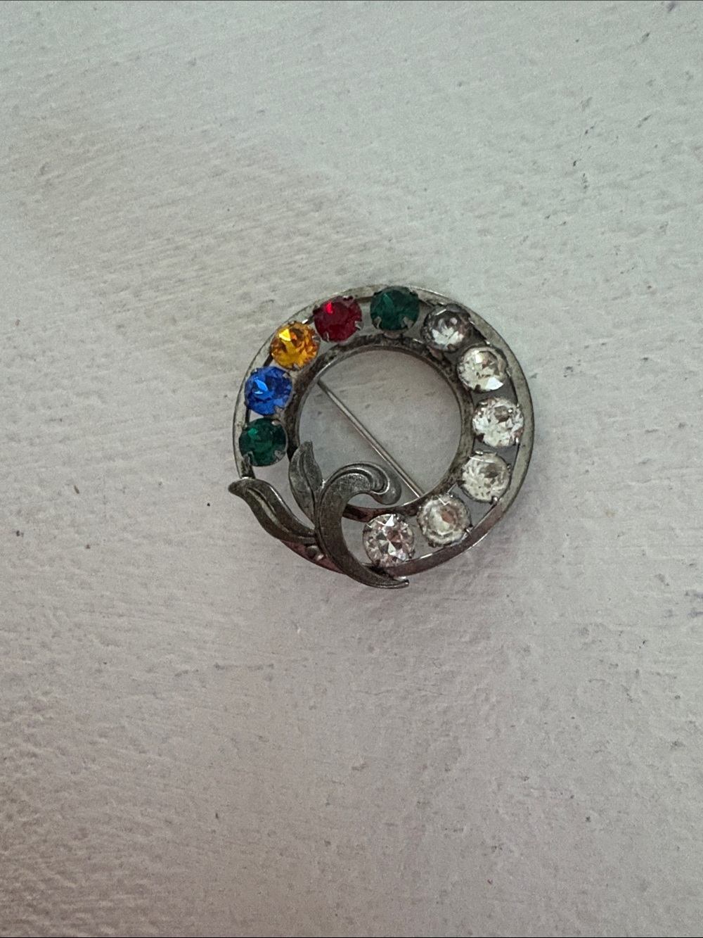Vintage sterling silver wreath brooch with colored gemstones